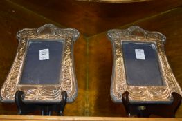 A pair of Art Nouveau silver photograph frames.