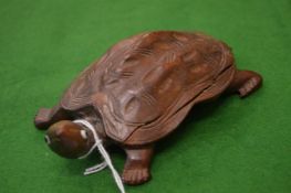 Japanese carved wood model of a tortoise.