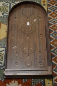 A bagatelle board.
