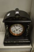 A Victorian slate mantle clock.