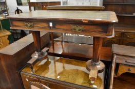 A Regency rosewood two drawer writing table.