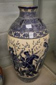 A large classical style pottery vase.