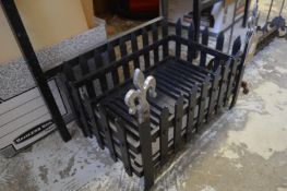 A cast iron firegrate.