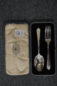 A cased silver Christening set.