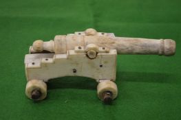 An unusual bone miniature model of a cannon, possibly prisoner of war.