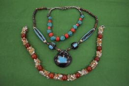 Decorative bead necklaces.