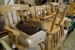 A set of six modern beech spindleback kitchen chairs, two with arms.