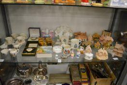 Model cottages, Hindhead crested ware and other collectable china.