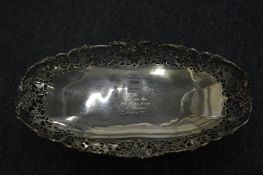 A good silver presentation rectangular shaped dish with pierced grape and vine border.