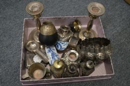 A pair of silver candlesticks, pair of Eastern white metal bowls with embossed decoration etc.