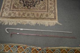 Two Nailsea glass sticks.