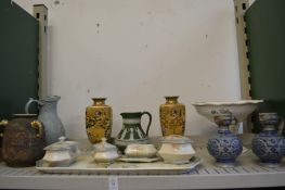 A shelf of decorative china.