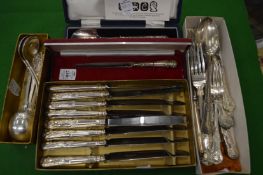 Silver and silver handled flatware.