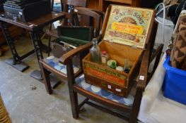 A set of four 1930's oak dining chairs, one with arms.