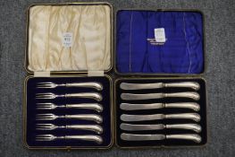 Cased sets containing pistol grip dessert knives and forks.