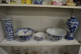 A group of Chinese blue and white porcelain to include a sleeve vase, baluster shaped vase and three