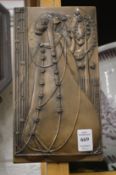 A pair of Art Nouveau style moulded plaques.