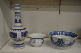 A Chinese blue and white porcelain vase (af) together with two blue and white bowls.