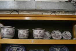 A set of three India Jane puce decorated jardinieres stands.