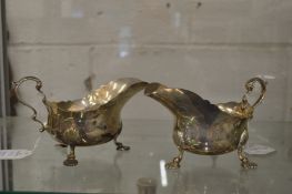 A good pair of silver sauce boats on shell cast feet.