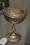 A silver plated chalice and cover.