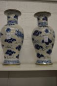 A pair of Chinese blue and white vases.