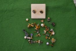 Various ear studs.