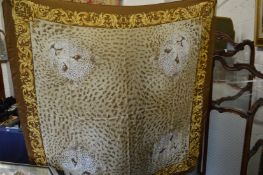 Three designer head scarfs.