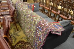 A large Casa Pupo type throw decorated with animals and flowers, signed, 282cm x 195cm.