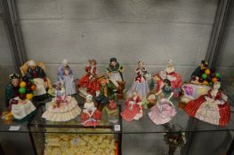 A good collection of Royal Doulton figures and figurines together with a Paragon china figurine.