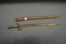 A bayonet and scabbard.