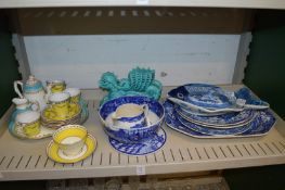 Blue and white plates and other items.