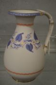 A classical revival painted and gilt decorated parian china jug.