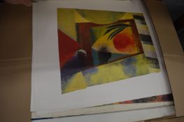 A quantity of unframed artwork.