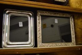 Two silver plated photograph frames.
