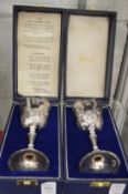 A pair of cased Harrods silver 'Mayflower' goblets.