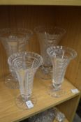 Two good pairs of cut glass trumpet shaped vases.
