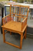 A Chinese hardwood armchair.