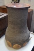 A highly unusual taxidermy elephants foot drinks cabinet with rising compartment to house four