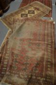 A Bokara style rug and another rug (as found).