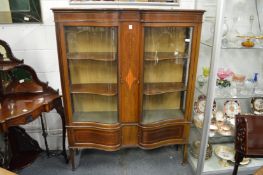 An Edwardian inlaid mahogany two door display cabinet.