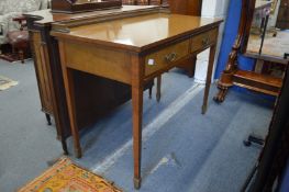 A Waring and Gillow mahogany two drawer side table.