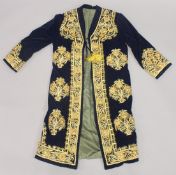 A MIDDLE EASTERN EMBROIDERED VELVET COAT.