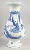 A CHINESE BLUE AND WHITE PORCELAIN VASE, painted with figures in a vase, 35.5cm high.