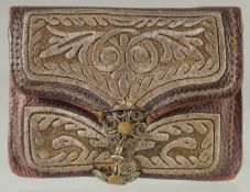 A SMALL OTTOMAN LEATHER PURSE.