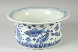 A CHINESE BLUE AND WHITE PORCELAIN BOWL, painted with fish and lotus, 26cm diameter.