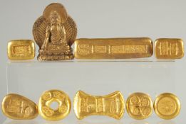 A COLLECTION OF EIGHT GILT BRONZE PAPERWEIGHTS, together with a small gilt bronze buddha, (9).