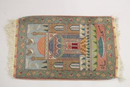 A SMALL 19TH CENTURY PICTORIAL TABRIZ RUG, with image of a mosque, 84cm x 54cm.