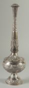 A FINE ISLAMIC SILVER ROSEWATER SPRINKLER, of typical form, with embossed and chased floral, leaf