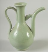 A CHINESE CELADON GLAZE EWER, 18.5cm high.